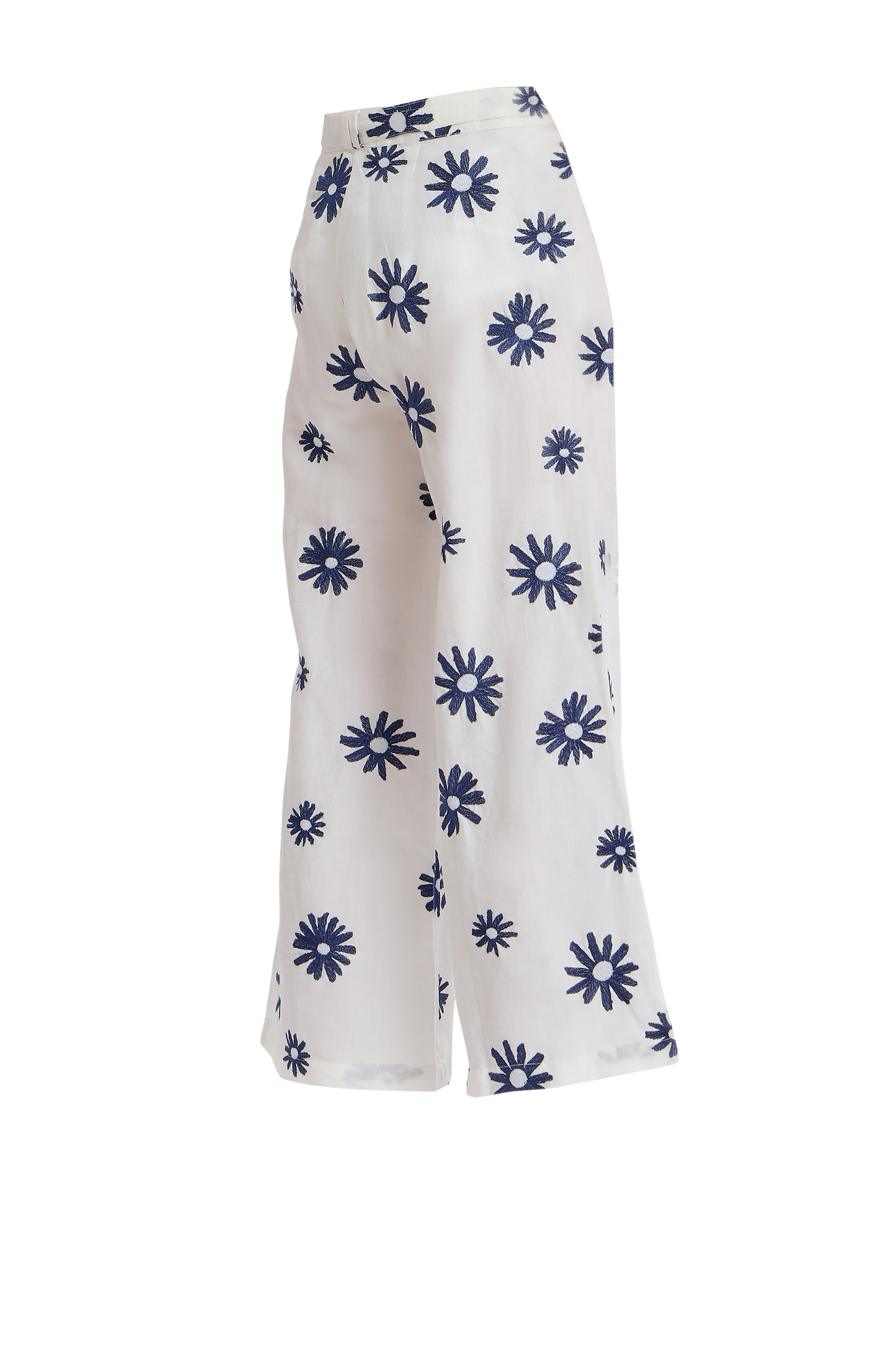 White embroidered wide-leg pants with matching belt, featuring floral designs on creamy fabric.